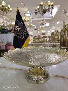 شیرینی خوری لب قلعه طرح طاووس پایه دار برنجی
